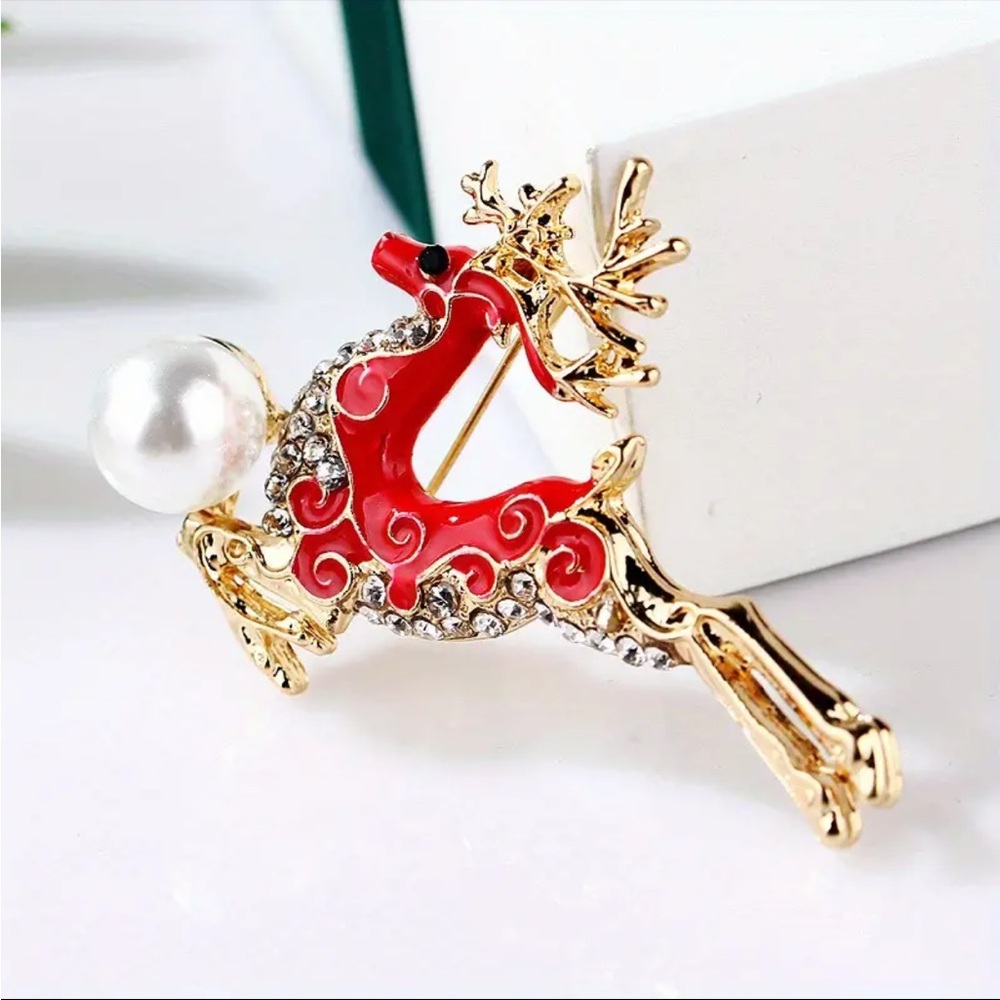 Brooch- reindeer, red enamel paint, NIP, 2” x 1.1”, rhinestones, display case